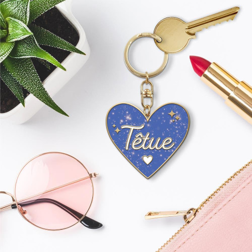 PORTE CLES PAILLETTES TETUE